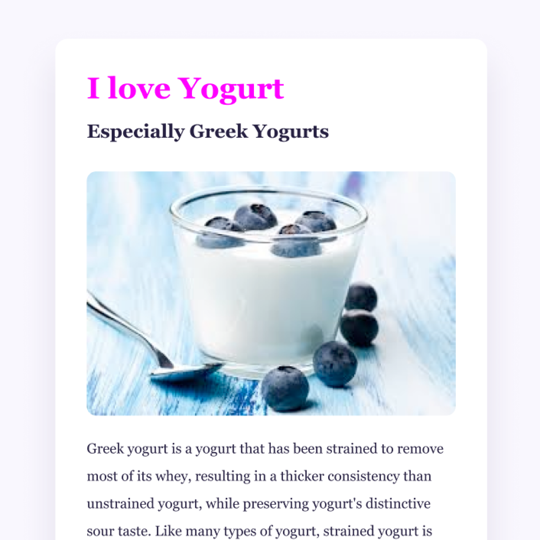 An image of some yogurt with blueberries.